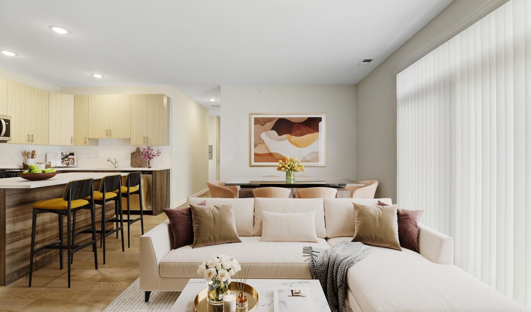 a living room with a couch and a dining table