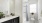 a bathroom with a tub sink and toilet