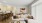 a living room with a couch and a dining table